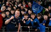 6 April 2024; Ciarán Frawley of Leinster with supporters after the Investec Champions Cup Round of 16 match between Leinster and Leicester Tigers at the Aviva Stadium in Dublin. Photo by Seb Daly/Sportsfile