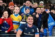 6 April 2024; James Lowe of Leinster with supporters after the Investec Champions Cup Round of 16 match between Leinster and Leicester Tigers at the Aviva Stadium in Dublin. Photo by Seb Daly/Sportsfile