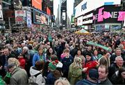 6 April 2024; Mayo supporters gather in Times Square ahead of the Connacht GAA Football Senior Championship quarter-final match between New York and Mayo at Gaelic Park in New York, USA. Photo by Sam Barnes/Sportsfile