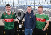 6 April 2024; Mayo supporters, from left, Josh Carney, Ethan Duffy and Mathew Dillon from Ballaghaderreen in Mayo at the Empire State Building before the Connacht GAA Football Senior Championship quarter-final match between New York and Mayo at Gaelic Park in New York, USA. Photo by Sam Barnes/Sportsfile