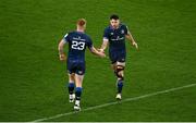 6 April 2024; Leinster players Hugo Keenan, right, and Ciarán Frawley during the Investec Champions Cup Round of 16 match between Leinster and Leicester Tigers at the Aviva Stadium in Dublin. Photo by Seb Daly/Sportsfile