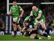 6 April 2024; Andrew Porter of Leinster is tackled by Harry Wells of Leicester Tigers during the Investec Champions Cup Round of 16 match between Leinster and Leicester Tigers at the Aviva Stadium in Dublin. Photo by Seb Daly/Sportsfile
