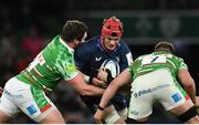 6 April 2024; Josh van der Flier of Leinster in action against Leicester Tigers players Julian Montoya, left, and James Cronin during the Investec Champions Cup Round of 16 match between Leinster and Leicester Tigers at the Aviva Stadium in Dublin. Photo by Seb Daly/Sportsfile