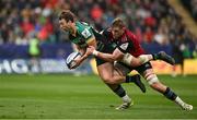 7 April 2024; James Ramm of Northampton Saints is tackled by Gavin Coombes of Munster during the Investec Champions Cup Round of 16 match between Northampton Saints and Munster at cinch Stadium at Franklin’s Gardens in Northampton, England. Photo by Brendan Moran/Sportsfile