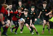 6 April 2024; Action from the Bank of Ireland Half-time Minis match between Birr RFC and Coolmine RFC at the Investec Champions Cup Round of 16 match between Leinster and Leicester Tigers at the Aviva Stadium in Dublin. Photo by Ramsey Cardy/Sportsfile