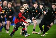 6 April 2024; Action from the Bank of Ireland Half-time Minis match between Birr RFC and Coolmine RFC at the Investec Champions Cup Round of 16 match between Leinster and Leicester Tigers at the Aviva Stadium in Dublin. Photo by Ramsey Cardy/Sportsfile