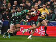 7 April 2024;Simon Zebo of Munster is tackled by Tommy Freeman and Lewis Ludlam of Northampton Saints during the Investec Champions Cup Round of 16 match between Northampton Saints and Munster at cinch Stadium at Franklin’s Gardens in Northampton, England. Photo by Brendan Moran/Sportsfile