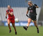 7 April 2024; Neasa Dooley of Kildare in action against Eimear Quinn of Tyrone during the Lidl LGFA National League Division 2 final match between Kildare and Tyrone at Croke Park in Dublin. Photo by Piaras Ó Mídheach/Sportsfile