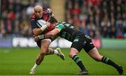 7 April 2024; Simon Zebo of Munster is tackled by Burger Odendaal of Northampton Saints during the Investec Champions Cup Round of 16 match between Northampton Saints and Munster at cinch Stadium at Franklin’s Gardens in Northampton, England. Photo by Brendan Moran/Sportsfile