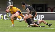 7 April 2024; James Hume of Ulster is tackled by Alex Becognee of Montpellier during the Challenge Cup Round of 16 match between Montpellier and Ulster at GGL Stadium in Montpellier, France. Photo by John Dickson/Sportsfile