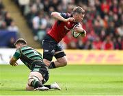 7 April 2024; Peter O’Mahony of Munster is tackled by Sam Graham of Northampton Saints during the Investec Champions Cup Round of 16 match between Northampton Saints and Munster at cinch Stadium at Franklin’s Gardens in Northampton, England. Photo by Brendan Moran/Sportsfile