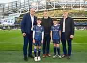 6 April 2024; Leinster players, from left, Rhys Ruddock, Rob Russell, and Tommy O'Brien with mascots Tadhg Duggan, left, age 10, from Blanchardstown, Dublin, and Ross connolly, age 11, Booterstown, Dublin, before the Investec Champions Cup Round of 16 match between Leinster and Leicester Tigers at the Aviva Stadium in Dublin. Photo by Seb Daly/Sportsfile