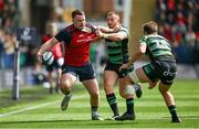 7 April 2024; Seán O’Brien of Munster is tackled by Ollie Sleightholme of Northampton Saints during the Investec Champions Cup Round of 16 match between Northampton Saints and Munster at cinch Stadium at Franklin’s Gardens in Northampton, England. Photo by Brendan Moran/Sportsfile