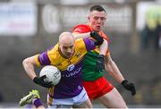 7 April 2024; Kevin O'Grady of Wexford in action against John Murphy of Carlow during the Leinster GAA Football Senior Championship Round 1 match between Wexford and Carlow at Chadwicks Wexford Park in Wexford. Photo by Tyler Miller/Sportsfile