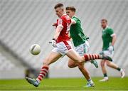 7 April 2024; Conor Corbett of Cork has a shot at goal despite the attempts of Cillian Fahy of Limerick during the Munster GAA Football Senior Championship quarter-final match between Cork and Limerick at SuperValu Páirc Ui Chaoimh in Cork. Photo by Tom Beary/Sportsfile