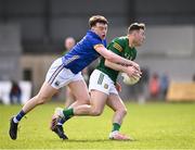 7 April 2024; Jordan Morris of Meath is tackled by Bryan Masterson of Longford during the Leinster GAA Football Senior Championship Round 1 match between Longford and Meath at Glennon Brothers Pearse Park in Longford. Photo by Ray McManus/Sportsfile