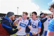 7 April 2024; Waterford players James Power, left, and Stephen Curry celebrate after their side's victory in the Munster GAA Football Senior Championship quarter-final match between Waterford and Tipperary at Fraher Field in Dungarvan, Waterford. Photo by Michael P Ryan/Sportsfile