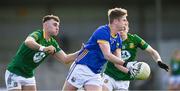 7 April 2024; Dessie Reynolds of Longford in action against Seán Coffey  of Meath during the Leinster GAA Football Senior Championship Round 1 match between Longford and Meath at Glennon Brothers Pearse Park in Longford. Photo by Ray McManus/Sportsfile