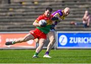 7 April 2024; Jamie Clarke of Carlow in action against Kevin O'Grady of Wexford during the Leinster GAA Football Senior Championship Round 1 match between Wexford and Carlow at Chadwicks Wexford Park in Wexford. Photo by Tyler Miller/Sportsfile