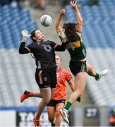 7 April 2024; Armagh goalkeeper Anna Carr competes for a high ball against Emma Dineen of Kerry during the Lidl LGFA National League Division 1 final match between Armagh and Kerry at Croke Park in Dublin. Photo by Stephen Marken/Sportsfile