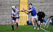 7 April 2024; Conor Brady of Cavan in action against Gary Mohan of Monaghan during the Ulster GAA Football Senior Championship preliminary round match between Monaghan and Cavan at St Tiernach's Park in Clones, Monaghan. Photo by Ramsey Cardy/Sportsfile