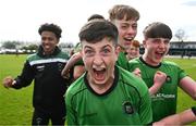 7 April 2024; Calum Casey of Peamount United, centre, and teammates celebrate after their side's victory in the FAI Under 17 Cup final match between Malahide United and Peamount United at Whitehall Stadium in Dublin. Photo by Seb Daly/Sportsfile