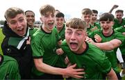 7 April 2024; Evan Heeney of Peamount United, second from right, and teammates celebrate after their side's victory in the FAI Under 17 Cup final match between Malahide United and Peamount United at Whitehall Stadium in Dublin. Photo by Seb Daly/Sportsfile
