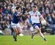 7 April 2024; Conor McCarthy of Monaghan in action against Gerard Smith of Cavan during the Ulster GAA Football Senior Championship preliminary round match between Monaghan and Cavan at St Tiernach's Park in Clones, Monaghan. Photo by Daire Brennan/Sportsfile