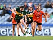 7 April 2024; Hannah O'Donoghue of Kerry takes a shot under pressure from Grace Ferguson of Armagh during the Lidl LGFA National League Division 1 final match between Armagh and Kerry at Croke Park in Dublin. Photo by Stephen Marken/Sportsfile