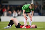 7 April 2024; Murrough McMahon of Peamount United consoles Pierce Walsh of Malahide United after the FAI Under 17 Cup final match between Malahide United and Peamount United at Whitehall Stadium in Dublin. Photo by Seb Daly/Sportsfile