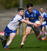7 April 2024; Oisin Brady of Cavan in action against David Garland of Monaghan during the Ulster GAA Football Senior Championship preliminary round match between Monaghan and Cavan at St Tiernach's Park in Clones, Monaghan. Photo by Ramsey Cardy/Sportsfile