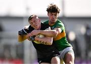 7 April 2024; Brian Cox of Sligo is tackled by Darragh Rooney of Leitrim during the Connacht GAA Football Senior Championship quarter-final match between Sligo and Leitrim at Avant Money Páirc Seán MacDiarmada in Carrick-on-Shannon, Leitrim. Photo by Ben McShane/Sportsfile