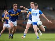 7 April 2024; Stephen Curry of Waterford in action against Colm O'Shaughnessy of Tipperary during the Munster GAA Football Senior Championship quarter-final match between Waterford and Tipperary at Fraher Field in Dungarvan, Waterford. Photo by Michael P Ryan/Sportsfile