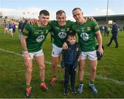 7 April 2024; Seven year old Cian Comey, from the Summerhill GAA Club with his Meath clubmates Eoghan Frayne, Ronan Ryan and Ross Ryan after the Leinster GAA Football Senior Championship Round 1 match between Longford and Meath at Glennon Brothers Pearse Park in Longford. Photo by Ray McManus/Sportsfile