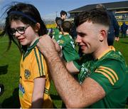 7 April 2024; Seán Coffey of Meath signs a shirt for a young Meath supporter after the Leinster GAA Football Senior Championship Round 1 match between Longford and Meath at Glennon Brothers Pearse Park in Longford. Photo by Ray McManus/Sportsfile