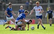 7 April 2024; Jason Irwin of Monaghan in action against Cian Madden of Cavan during the Ulster GAA Football Senior Championship preliminary round match between Monaghan and Cavan at St Tiernach's Park in Clones, Monaghan. Photo by Daire Brennan/Sportsfile