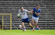 7 April 2024; Jack McCarron of Monaghan in action against Killian Brady of Cavan during the Ulster GAA Football Senior Championship preliminary round match between Monaghan and Cavan at St Tiernach's Park in Clones, Monaghan. Photo by Daire Brennan/Sportsfile