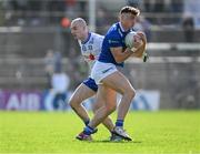 7 April 2024; Conor Brady of Cavan in action against Kevin Loughran of Monaghan during the Ulster GAA Football Senior Championship preliminary round match between Monaghan and Cavan at St Tiernach's Park in Clones, Monaghan. Photo by Daire Brennan/Sportsfile