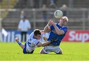 7 April 2024; Padraig Faulkner of Cavan in action against Jason Irwin of Monaghan during the Ulster GAA Football Senior Championship preliminary round match between Monaghan and Cavan at St Tiernach's Park in Clones, Monaghan. Photo by Daire Brennan/Sportsfile