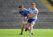 7 April 2024; Ciarán Brady of Cavan in action against Conor McCarthy of Monaghan during the Ulster GAA Football Senior Championship preliminary round match between Monaghan and Cavan at St Tiernach's Park in Clones, Monaghan. Photo by Daire Brennan/Sportsfile