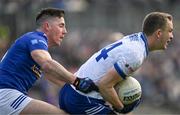 7 April 2024; Jack McCarron of Monaghan in action against Killian Brady of Cavan during the Ulster GAA Football Senior Championship preliminary round match between Monaghan and Cavan at St Tiernach's Park in Clones, Monaghan. Photo by Daire Brennan/Sportsfile