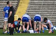 7 April 2024; Darren Hughes of Monaghan is treated for an injury during the Ulster GAA Football Senior Championship preliminary round match between Monaghan and Cavan at St Tiernach's Park in Clones, Monaghan. Photo by Ramsey Cardy/Sportsfile