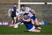 7 April 2024; James Smith of Cavan in action against Darren Hughes of Monaghan during the Ulster GAA Football Senior Championship preliminary round match between Monaghan and Cavan at St Tiernach's Park in Clones, Monaghan. Photo by Ramsey Cardy/Sportsfile