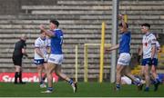 7 April 2024; Conor Brady, left, and Oisin Kiernan of Cavan celebrate their side's first goal, scored by Padraig Faulkner, during the Ulster GAA Football Senior Championship preliminary round match between Monaghan and Cavan at St Tiernach's Park in Clones, Monaghan. Photo by Ramsey Cardy/Sportsfile