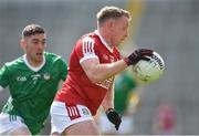 7 April 2024; Brian Hurley of Cork in action against Paul Maher of Limerick during the Munster GAA Football Senior Championship quarter-final match between Cork and Limerick at SuperValu Páirc Ui Chaoimh in Cork. Photo by Tom Beary/Sportsfile