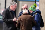 7 April 2024; Ciaran Mullooly, left, canvassing before the Leinster GAA Football Senior Championship Round 1 match between Longford and Meath at Glennon Brothers Pearse Park in Longford. Photo by Ray McManus/Sportsfile