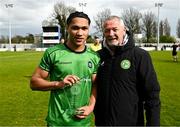 7 April 2024; Isaac Millington of Peamount United is presented with the Player of the Match award by FAI board member and chairperson of the FAI Youth and Amateur Committee David Moran after the FAI Under 17 Cup final match between Malahide United and Peamount United at Whitehall Stadium in Dublin. Photo by Seb Daly/Sportsfile