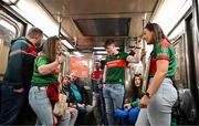 7 April 2024; Mayo supporters including Hannah Davidson, from Foxford, left, and Emma Coleman from Knockmore, right, ride the number one subway before the Connacht GAA Football Senior Championship quarter-final match between New York and Mayo at Gaelic Park in New York, USA. Photo by Sam Barnes/Sportsfile