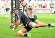 7 April 2024; Sacha Zegueur of Section Paloise scores his side's first try during the Challenge Cup Round of 16 match between Section Paloise and Connacht at Stade du Hameau in Pau, France. Photo by Loic Cousin/Sportsfile