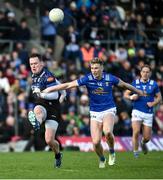 7 April 2024; Monaghan goalkeeper Rory Beggan in action against Paddy Lynch of Cavan during the Ulster GAA Football Senior Championship preliminary round match between Monaghan and Cavan at St Tiernach's Park in Clones, Monaghan. Photo by Ramsey Cardy/Sportsfile